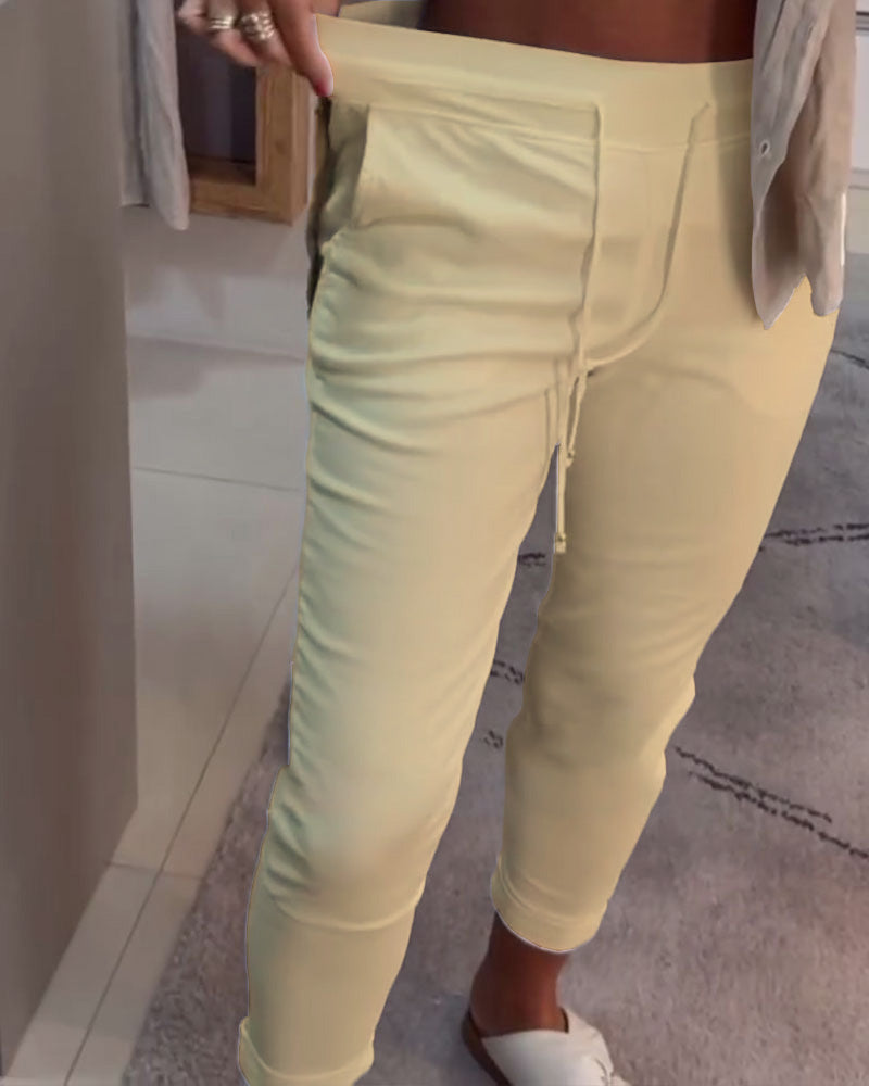 Nahia – Soepelvallende broek met trekkoord, elastische taille, relaxte rechte pasvorm