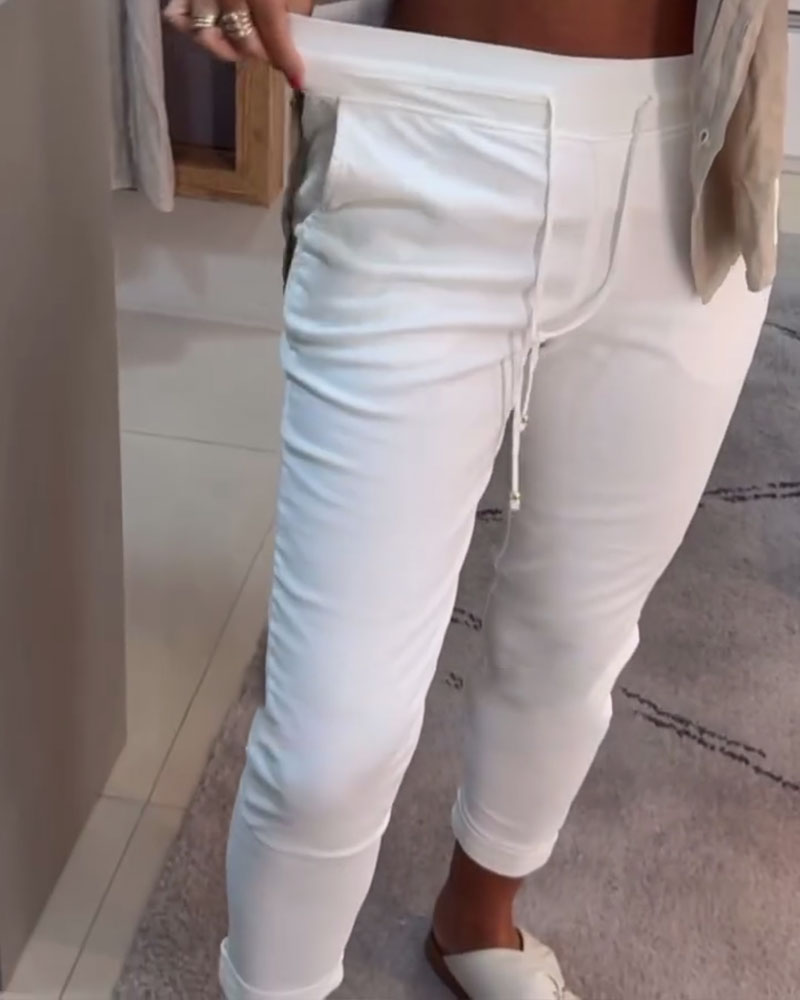 Nahia – Soepelvallende broek met trekkoord, elastische taille, relaxte rechte pasvorm