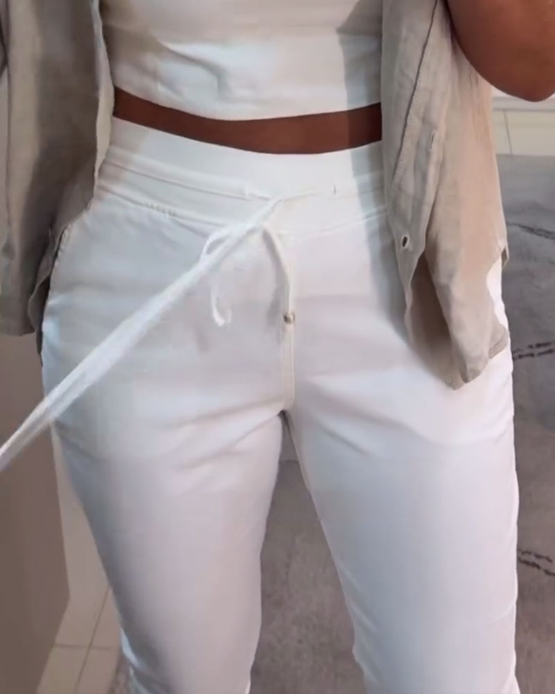 Nahia – Soepelvallende broek met trekkoord, elastische taille, relaxte rechte pasvorm