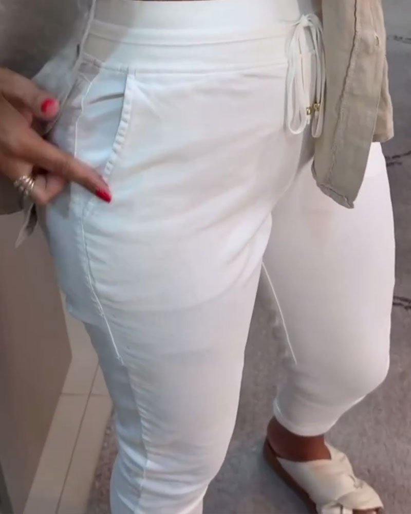 Nahia – Soepelvallende broek met trekkoord, elastische taille, relaxte rechte pasvorm