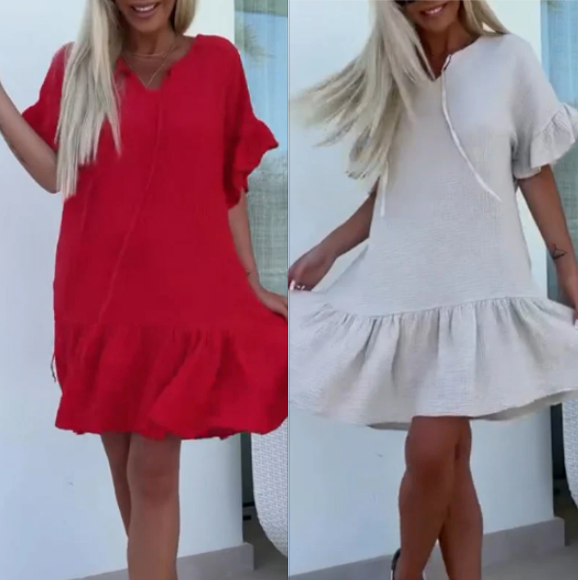 Korte damesjurken met bloemenprint en korte mouwen in effen kleuren