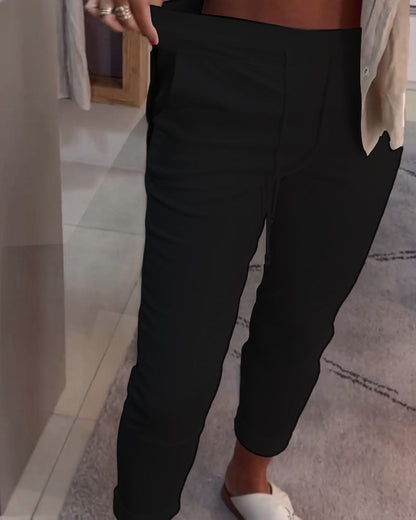 Nahia – Soepelvallende broek met trekkoord, elastische taille, relaxte rechte pasvorm