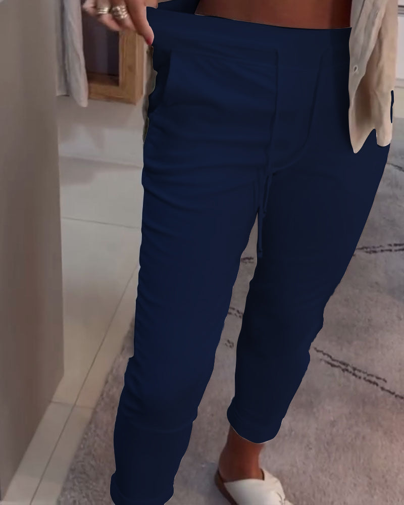 Nahia – Soepelvallende broek met trekkoord, elastische taille, relaxte rechte pasvorm