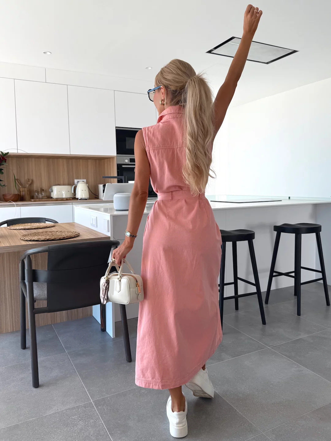 Effen denimjurk met knoopzak