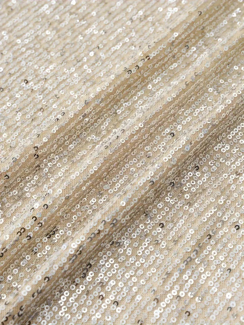 Glamoureuze paillettenjurk met contrast voor onvergetelijke feestavonden