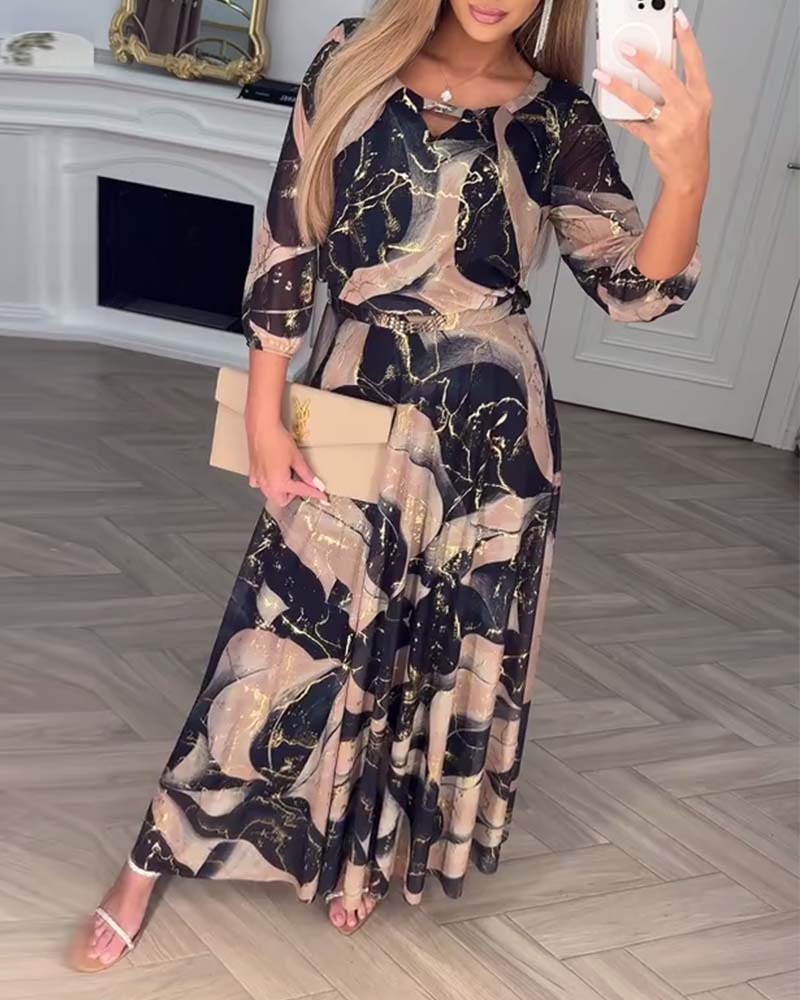 Oria – Elegante printjurk met 3/4 mouwen en getailleerde taille