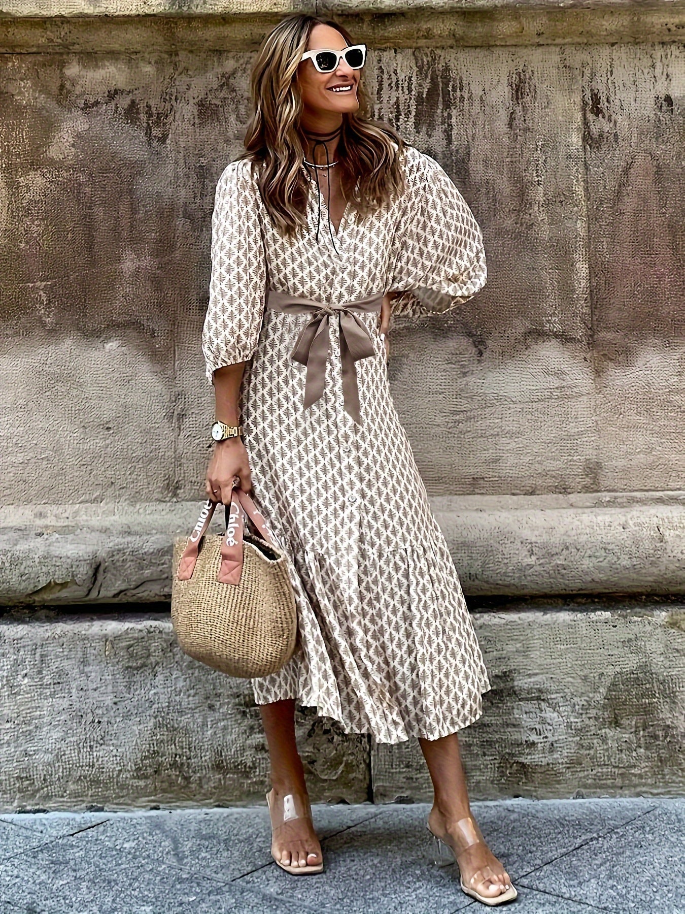 Daganna | Elegante jurk met knoopjes en strikdetail