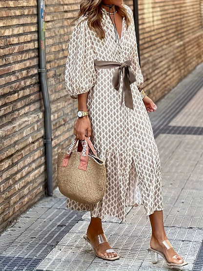 Daganna | Elegante jurk met knoopjes en strikdetail