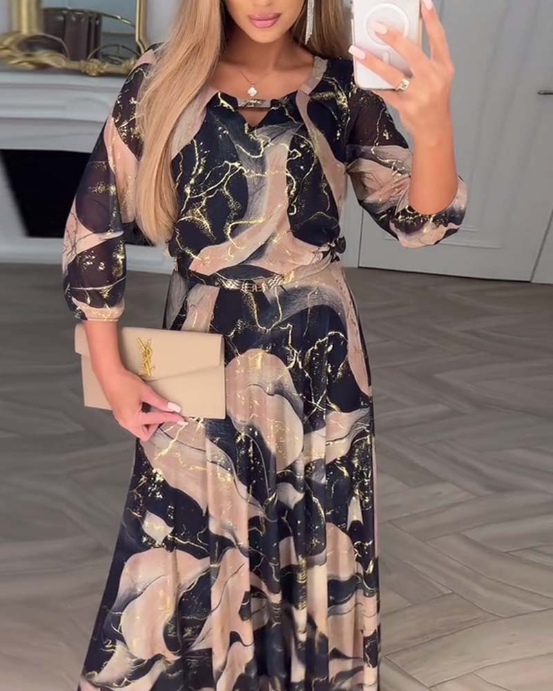 Oria – Elegante printjurk met 3/4 mouwen en getailleerde taille