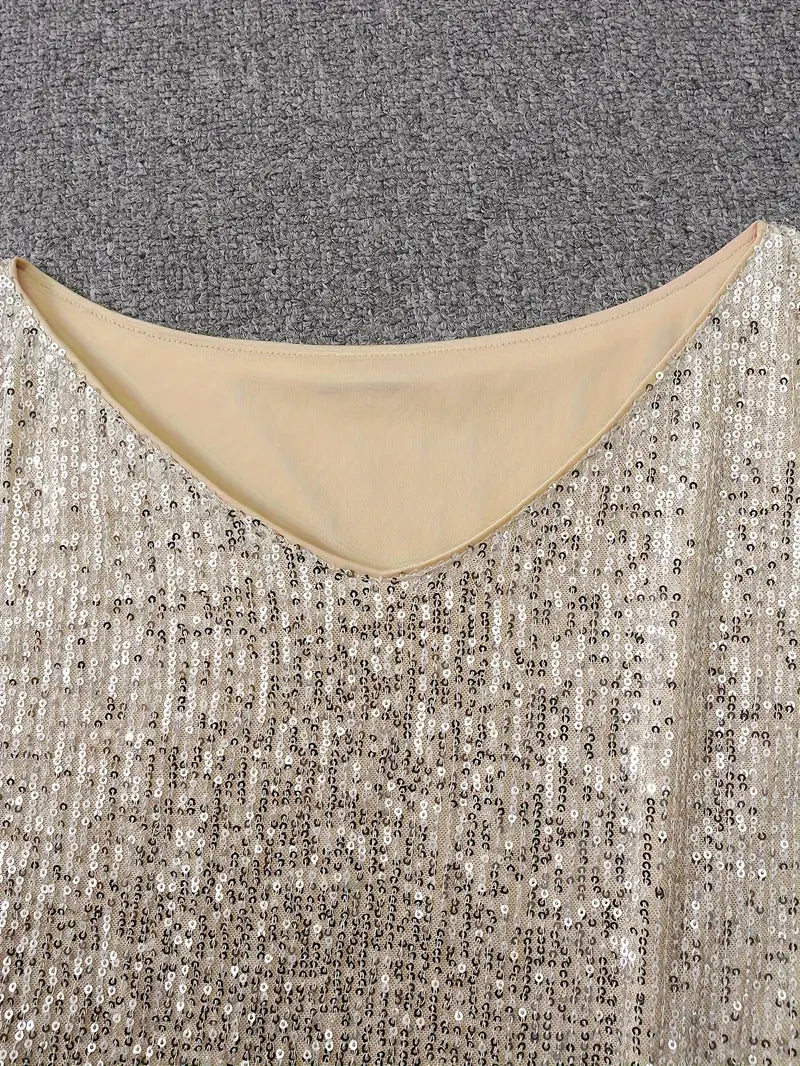 Glamoureuze paillettenjurk met contrast voor onvergetelijke feestavonden
