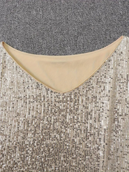 Glamoureuze paillettenjurk met contrast voor onvergetelijke feestavonden