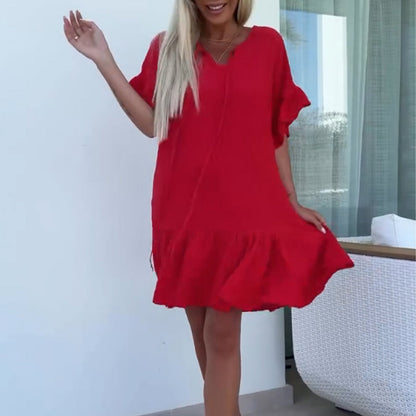 Korte damesjurken met bloemenprint en korte mouwen in effen kleuren