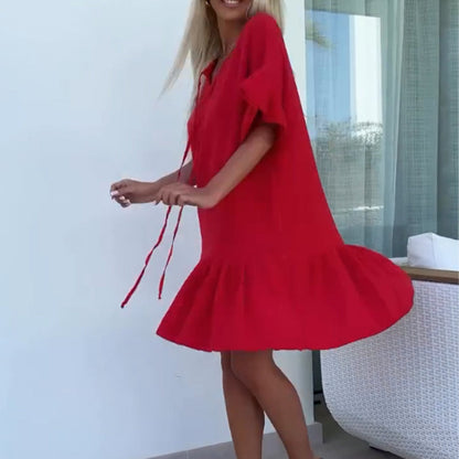 Korte damesjurken met bloemenprint en korte mouwen in effen kleuren